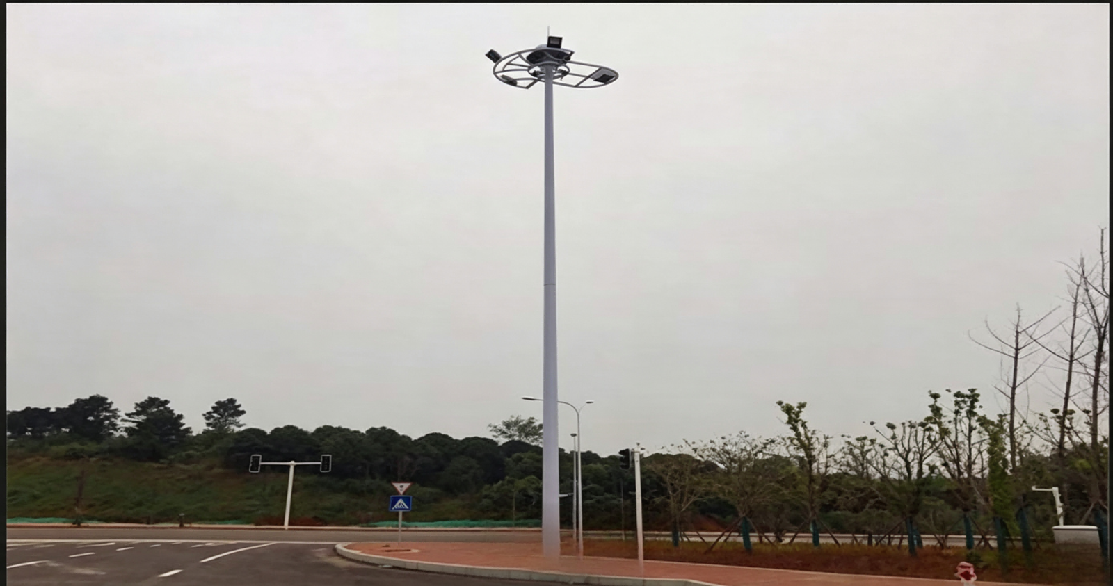 Airport apron and perimeter road lit by high-power LED floodlights