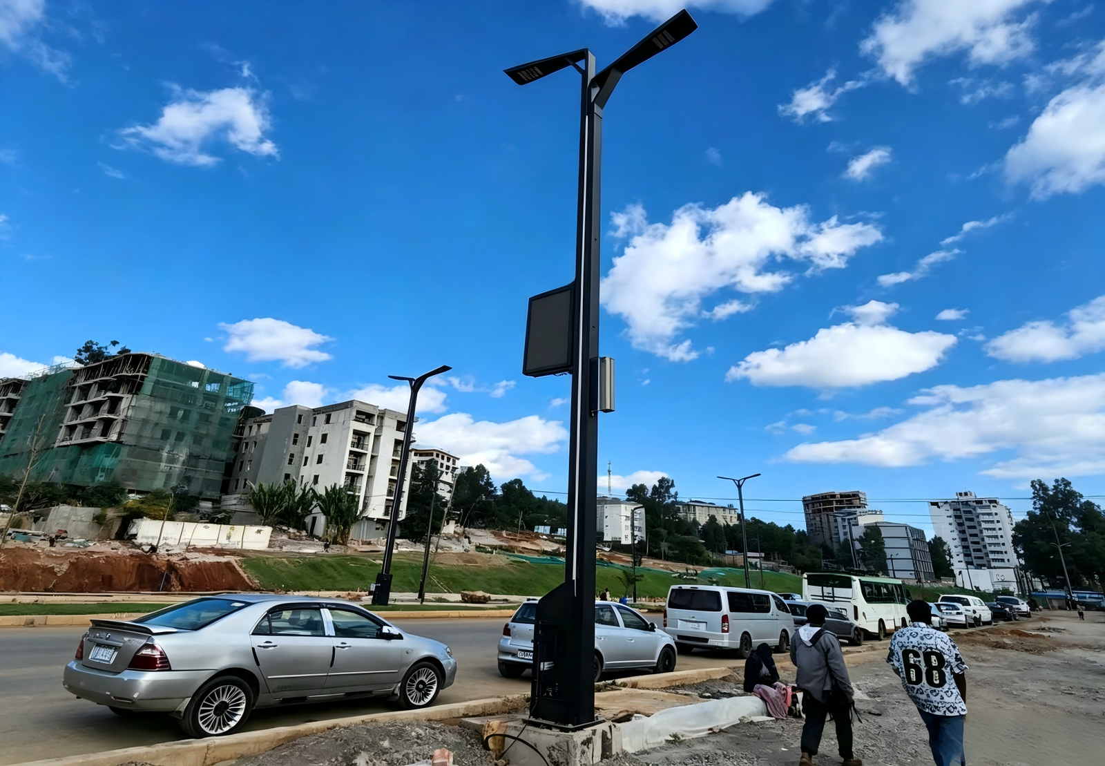 Smart city street with IoT-connected LED lighting and sensor nodes