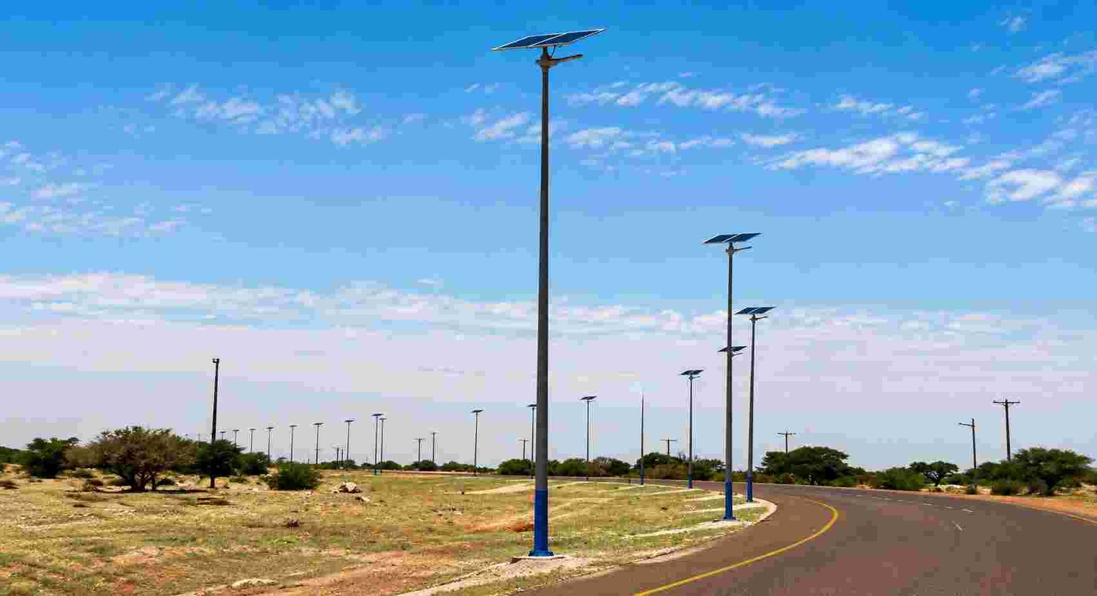 Municipal road illuminated with solar LED street lights at night